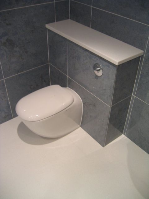 Corian Wet Room floor under WC and Cistern Cover