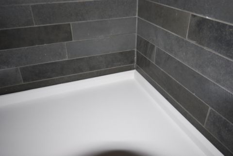Shower detail to tiled wall
