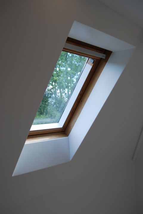 Seamless Wall Panel Junction with Velux Window Reveal 