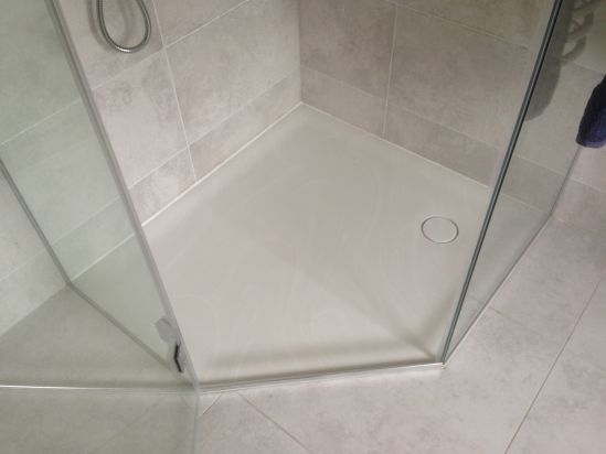Bespoke Angled Shower Tray in Veined Corian