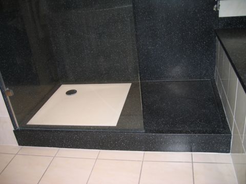 Black and White Shower Tray with Draining Area